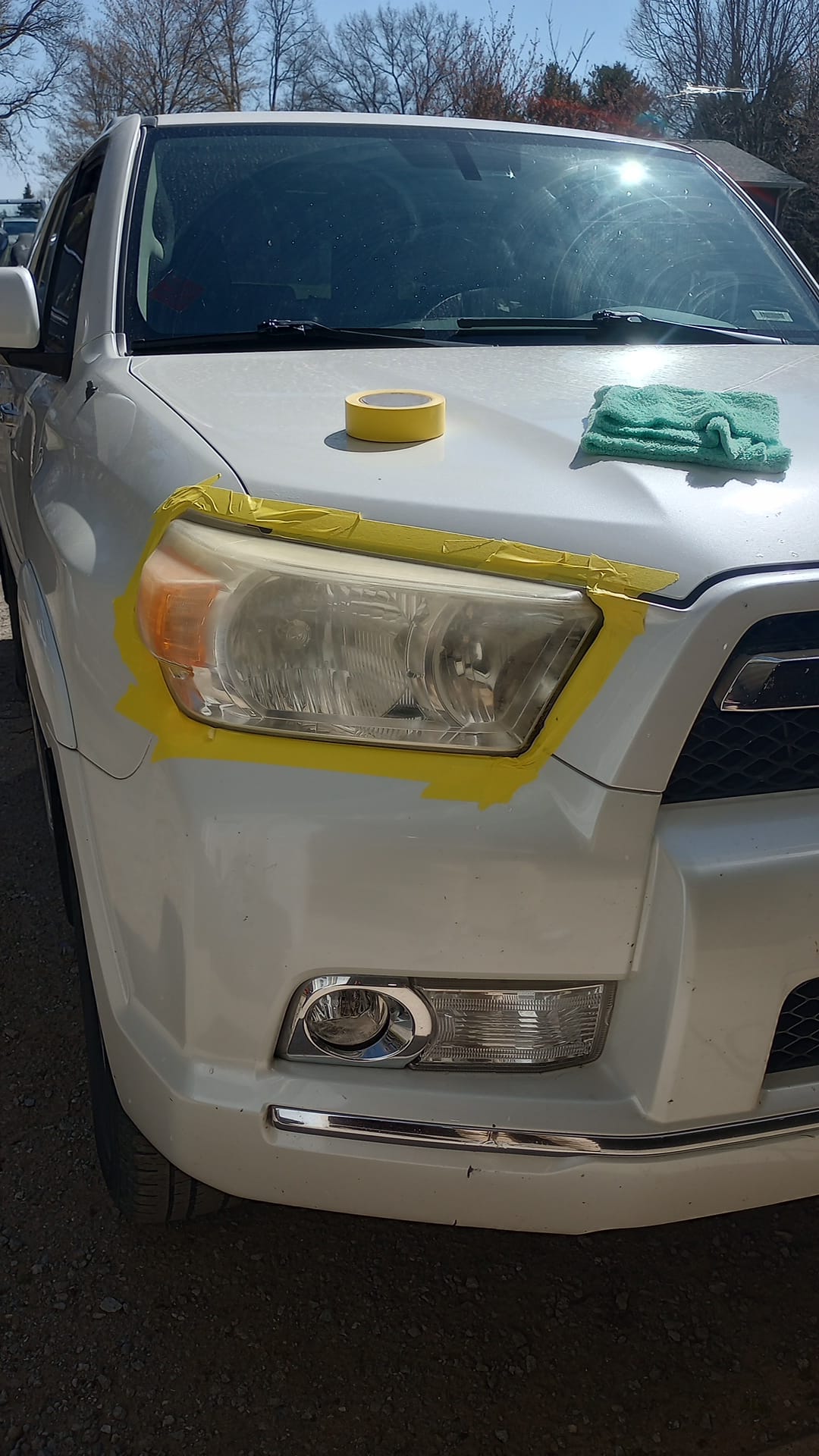 Headlight before restoration — yellowed and oxidized
